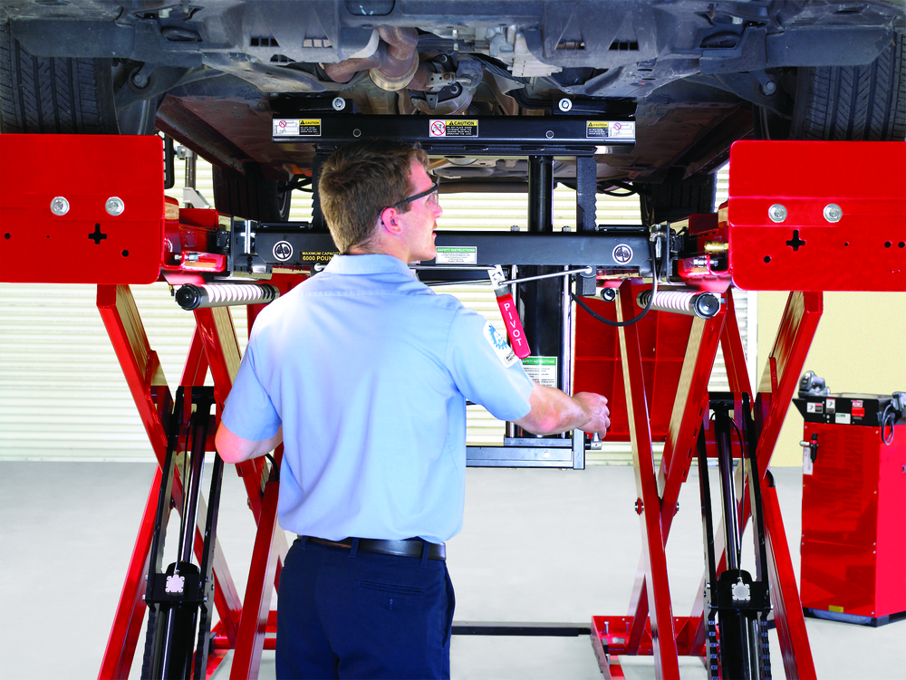 This drive-on scissor lift is equipped with additional lighting and air jacks, two very handy options which greatly increase the utility of the lift.