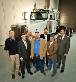 Pictured with the first of 60 Peterbilt LNG Model 388 Day Cabs that will be used by Green Energy Oilfield Services to provide vacuum and winch service to XTO Energy in the Freestone Play in Fairfield, Texas are (from l.) Ken Kirby, XTO Energy; Luke Bateman, Lone Star Investment Advisors; Keith Rand, Green Energy Oilfield Services; Roger Nevill, Green Energy Oilfield Services; Arthur Hollingsworth; Kent Kendall, Green Energy Oilfield Services; John McGuire, Lone Star Investment Advisors. Pictured with the first of 60 Peterbilt LNG Model 388 Day Cabs that will be used by Green Energy Oilfield Services to provide vacuum and winch service to XTO Energy in the Freestone Play in Fairfield, Texas are (from l.) Ken Kirby, XTO Energy; Luke Bateman, Lone Star Investment Advisors; Keith Rand, Green Energy Oilfield Services; Roger Nevill, Green Energy Oilfield Services; Arthur Hollingsworth; Kent Kendall, Green Energy Oilfield Services; John McGuire, Lone Star Investment Advisors.
