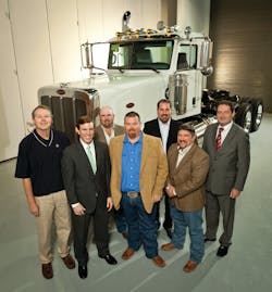 Pictured with the first of 60 Peterbilt LNG Model 388 Day Cabs that will be used by Green Energy Oilfield Services to provide vacuum and winch service to XTO Energy in the Freestone Play in Fairfield, Texas are (from l.) Ken Kirby, XTO Energy; Luke Bateman, Lone Star Investment Advisors; Keith Rand, Green Energy Oilfield Services; Roger Nevill, Green Energy Oilfield Services; Arthur Hollingsworth; Kent Kendall, Green Energy Oilfield Services; John McGuire, Lone Star Investment Advisors.