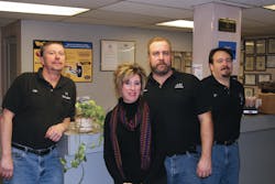 From left to right: Body shop manager John Korma, owners LeeAnne and Chris Walki, mechanical shop manager Joe Fordyce.