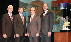 Edmonton Kenworth is honored with the prestigious 2011 Kenworth Dealer of the Year Award. From left are Gary Moore, Kenworth general manager and PACCAR vice president; Edmonton Kenworth executives Collin Ferguson and Gary M. King; and Preston Feight, Kenworth assistant general manager - marketing and sales. Edmonton Kenworth is honored with the prestigious 2011 Kenworth Dealer of the Year Award. From left are Gary Moore, Kenworth general manager and PACCAR vice president; Edmonton Kenworth executives Collin Ferguson and Gary M. King; and Preston Feight, Kenworth assistant general manager - marketing and sales.