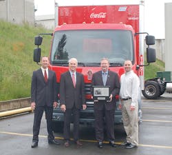 Kenworth Truck Company's first Kenworth K370 canover was officially presented to the Coca-Cola Refreshments fleet operation in Bellevue, Wash., during a special ceremony on May 24. From left are Preston Feight, Kenworth assistant general manager for sales and marketing; Gary Moore, Kenworth general manager and PACCAR vice president; Coca-Cola Refreshments' Bob Slack, vice president for the Pacific Northwest Marketings Unit; and Curt Kazen, Bellevue distribution manager. Kenworth Truck Company's first Kenworth K370 canover was officially presented to the Coca-Cola Refreshments fleet operation in Bellevue, Wash., during a special ceremony on May 24. From left are Preston Feight, Kenworth assistant general manager for sales and marketing; Gary Moore, Kenworth general manager and PACCAR vice president; Coca-Cola Refreshments' Bob Slack, vice president for the Pacific Northwest Marketings Unit; and Curt Kazen, Bellevue distribution manager.
