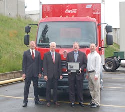 Kenworth Truck Company&apos;s first Kenworth K370 canover was officially presented to the Coca-Cola Refreshments fleet operation in Bellevue, Wash., during a special ceremony on May 24. From left are Preston Feight, Kenworth assistant general manager for sales and marketing; Gary Moore, Kenworth general manager and PACCAR vice president; Coca-Cola Refreshments&apos; Bob Slack, vice president for the Pacific Northwest Marketings Unit; and Curt Kazen, Bellevue distribution manager.