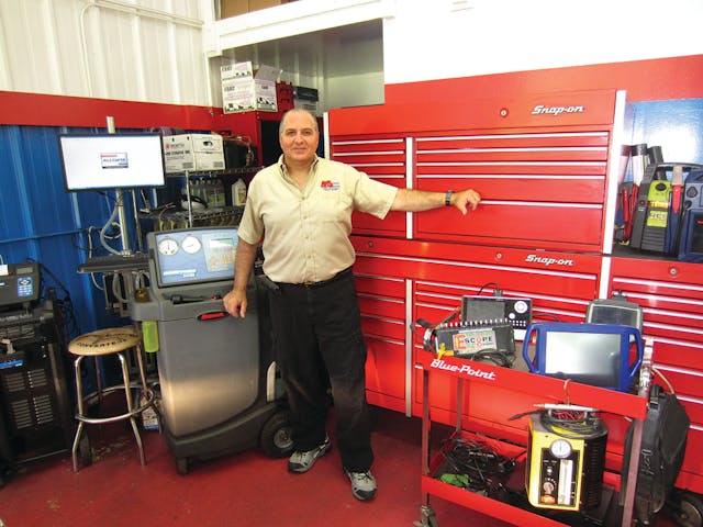 G &apos;Jerry&apos; Truglia posing in front of his box and cart
