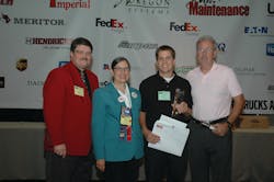 Christopher Barnett of Ryder Systems was named the Grand Champion of the TMCSuperTech 2012 Competition. Pictured left to right with Barnett are TMC General Chairman Lee Long, Professional Technician Development Committee Chairwoman Bonne Karim and George Arrants, TMCSuperTech contest chairman. Christopher Barnett of Ryder Systems was named the Grand Champion of the TMCSuperTech 2012 Competition. Pictured left to right with Barnett are TMC General Chairman Lee Long, Professional Technician Development Committee Chairwoman Bonne Karim and George Arrants, TMCSuperTech contest chairman.