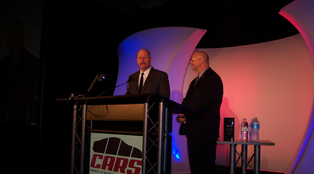 Bill Moss, left, CARS chairman, joins Ron Nagy, NACE chairman, in welcoming attendees to the opening general session of Automotive Service &amp; Repair Week at the Morial Convention Center in New Orleans, La.