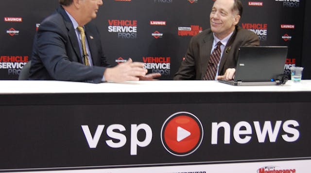 AAIA&apos;s Scott Luckett, left, talks about the AAIA Telematics Challenge during a live streaming segment at AAPEX 2012.