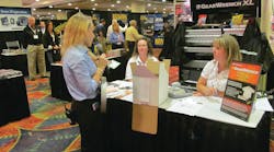 The &apos;prize girl&apos; announces a raffle winner at the 2012 MEDCO show in Philadelphia.