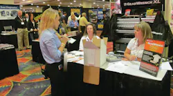 The 'prize girl' announces a raffle winner at the 2012 MEDCO show in Philadelphia.