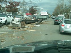 Hurricane Sandy carried boats from marinas onto city streets in Long Island. Rick Sculco came across this scene in his community.
