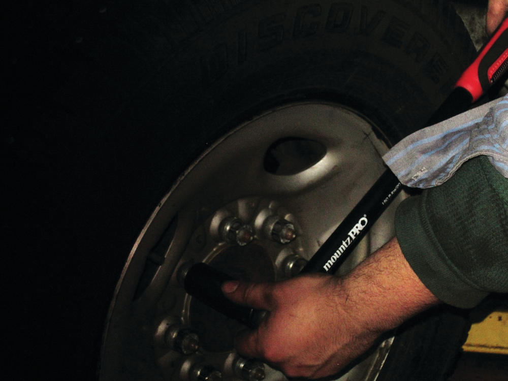 Figure 7: Using a torque wrench on every wheel that leaves that comes off the car equals zero comebacks. Some torque wrenches, like the Mountz PRO, have both metric and standard measurements make it quicker for the technician to tighten the fasteners without using a conversion chart. For more information on the Mountz Pro check out www.VehicleServicePros.com/10914907.