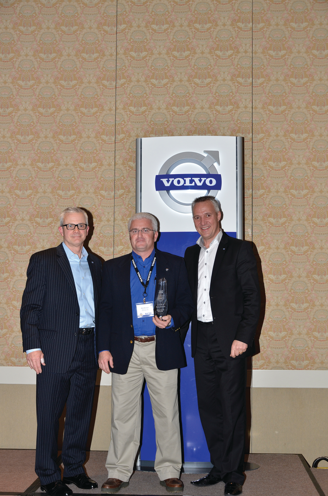 GATR dealer principal Bob Neitzke (center) receives the 2012 U.S. Dealer of the Year award from (left ) Terry Billings, Volvo Trucks vice president &ndash; business development and (right) G&ouml;ran Nyberg, president, Volvo Trucks North American Sales & Marketing.