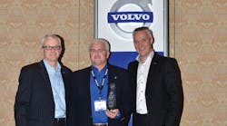 GATR dealer principal Bob Neitzke (center) receives the 2012 U.S. Dealer of the Year award from (left ) Terry Billings, Volvo Trucks vice president &ndash; business development and (right) G&ouml;ran Nyberg, president, Volvo Trucks North American Sales &amp; Marketing.
