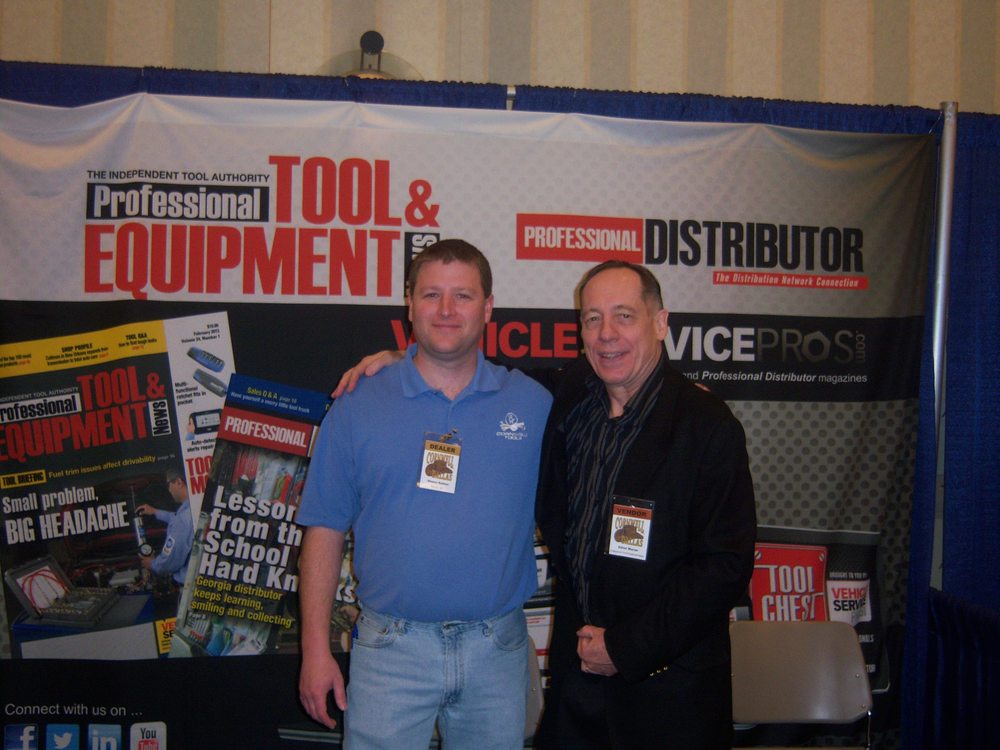 Shane Sutton, left, an Oklahoma City, Okla. Cornwell dealer, visits with Elliot Maras at the Professional Distributor booth.