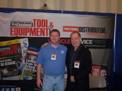 Shane Sutton, left, an Oklahoma City, Okla. Cornwell dealer, visits with Elliot Maras at the Professional Distributor booth.