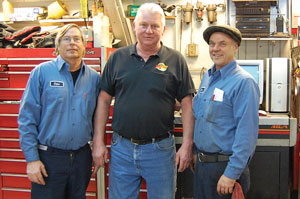 Charles 'Chuck' Benart, pictured center, co-owner of Roselle, Ill.-based Auto Tech & Body, passed away on March 25. He's pictured with two employees, Dave Holmes (left) and Rollin Hansen (right).