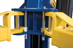 Swing arm lifts employ restraint devices to prevent arms from shifting or dislodging after a vehicle is already mounted and raised. Swing arm lifts employ restraint devices to prevent arms from shifting or dislodging after a vehicle is already mounted and raised.