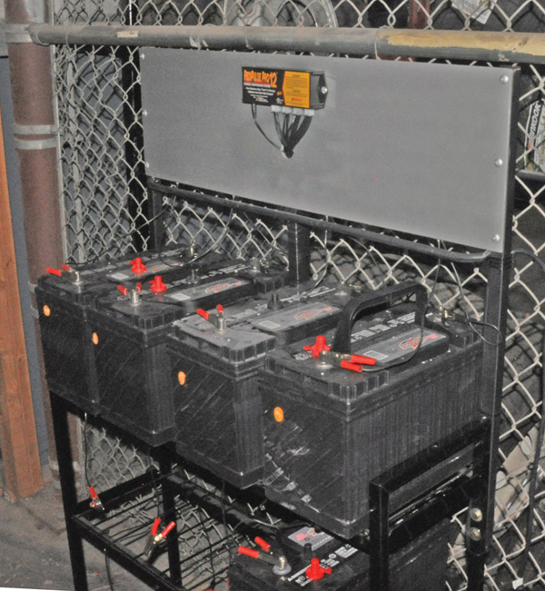 The PulseTech PRO-12-RP 12-station 12V lead-acid battery maintenance system