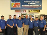Larry Weathers III (sixth from left) and the team at Weather Motors are honored as the Federated Shop of the Year.