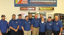 Larry Weathers III (sixth from left) and the team at Weather Motors are honored as the Federated Shop of the Year.
