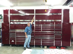 Brian Hall&apos;s can&apos;t reach the top of the massive toolbox.