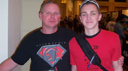 Wayne Rathbun and his son, Aaron Rathbun, take in the displays during the Matco Tools distributor tools show in San Diego, Calif.
