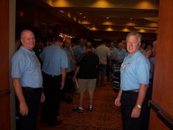 John Cross, left, and Pete Hofbauer, right, welcome attendees to the trade show during the grand opening. John Cross, left, and Pete Hofbauer, right, welcome attendees to the trade show during the grand opening.