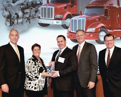 The award was presented during Peterbilt's annual Dealer Meeting. The award was presented during Peterbilt's annual Dealer Meeting.