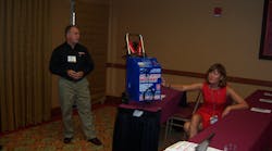 Joe Mocerino and Kim Cottle of Associated Equipment discuss the benefits of AGM batteries during the Ace Tool Co. dealer expo. Joe Mocerino and Kim Cottle of Associated Equipment discuss the benefits of AGM batteries during the Ace Tool Co. dealer expo.