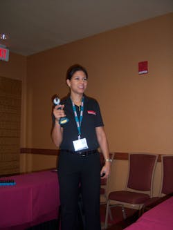 Tenille Redman demonstrates a Makita tool with a lithium ion battery. Tenille Redman demonstrates a Makita tool with a lithium ion battery.