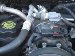 An A/C compressor in a 2004 Jeep Liberty.