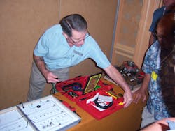 Jaime Lazarus demonstrates the capabilities of Power Probe tools during the ISN show in Orlando, Fla. Jaime Lazarus demonstrates the capabilities of Power Probe tools during the ISN show in Orlando, Fla.