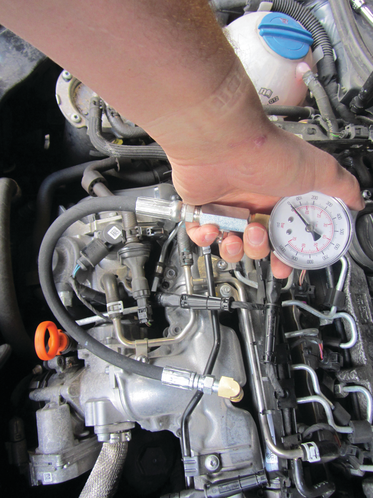 Figure 7: The diesel compression adapter and gauge assembly is used diagnostically in the same fashion as gasoline-engine compression gauges. Usually, diesel related misfires are related to clogged fuel injectors, but loss of cylinder compression can occur at very high mileages. For more information on the Lang Tools TU-15 Diesel Compression Gauge check out www.VehicleServicePros.com/11190384.