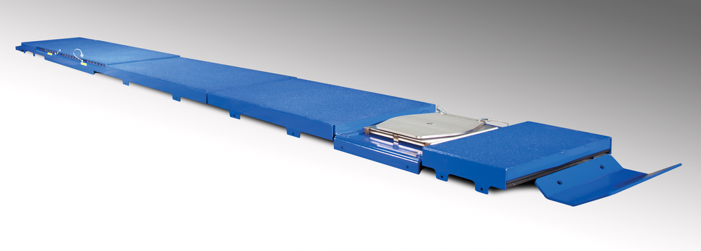 With the retrofit installed, technicians can use an SM-series lift to align most vehicles, from work trucks to day cabs.