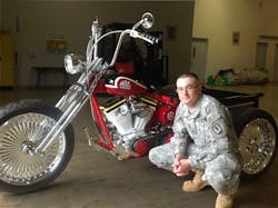 Donovan Finch receives his winning trike for Mac Tools 75th anniversary. Donovan Finch receives his winning trike for Mac Tools 75th anniversary.