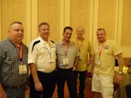 At left, Tony Quinn, Mike Procter, Steve Gill, Scott Buechler and John Duden of Autologue Compuer Systems enjoy AAPEX hospitality. The company supplies inventory management systems for automotive warehouse distributors and jobbers.