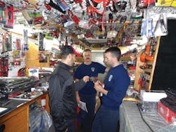 Manning explains an impact ratchet on his trailer. Manning explains an impact ratchet on his trailer.