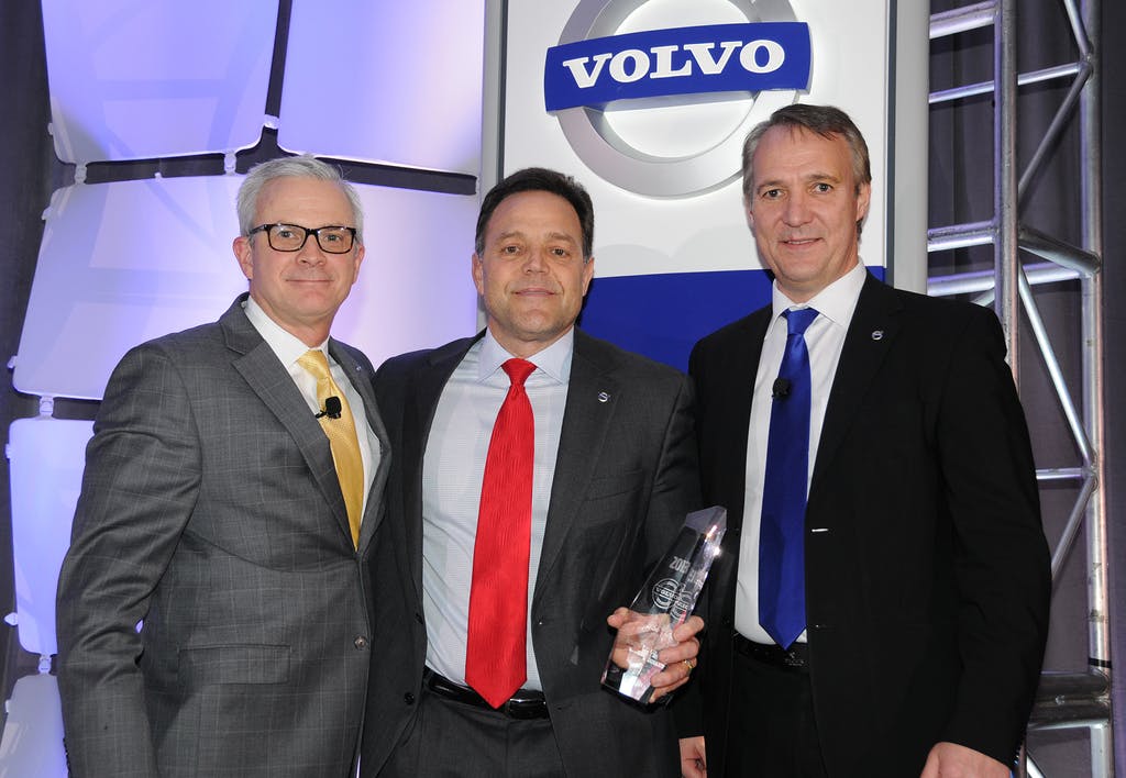 Nacarato Volvo Vice President Joe Nacarato (center) receives the 2013 Volvo Trucks North American Dealer of the Year from (left) Terry Billings, Volvo Trucks vice president &ndash; business development and (right) G&ouml;ran Nyberg, president, Volvo Trucks North American Sales &amp; Marketing.