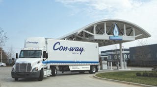 A new Freightliner Cascadia 113 day cab leaves a natural gas fueling station in Rock Hill, S.C. after taking on its first fill-up of compressed natural gas (CNG). Con-way Freight, one of the nation&apos;s leading commercial trucking firms, took delivery of the unit recently and is putting it into service in the Texas market. Featuring the Cummins Westport ISX 12 G natural gas-powered engine, it&apos;s Freightliner&apos;s first Cascadia 113 day cab with factory installed tanks to go into service.