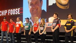 The race car drivers who support Mac Tools take center stage during the Tool Fair Kickoff.