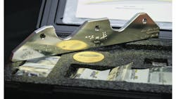 The ProMaxx Tools Rocky exhaust manifold stud repair tool, for use on both two and three valve versions of the 4.6L, 5.4L and 6.8L V-10 Ford gas engines. The ProMaxx Tools Rocky exhaust manifold stud repair tool, for use on both two and three valve versions of the 4.6L, 5.4L and 6.8L V-10 Ford gas engines.