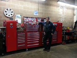 David Lewis stands with his combo Mac Tools and Snap-on toolbox.