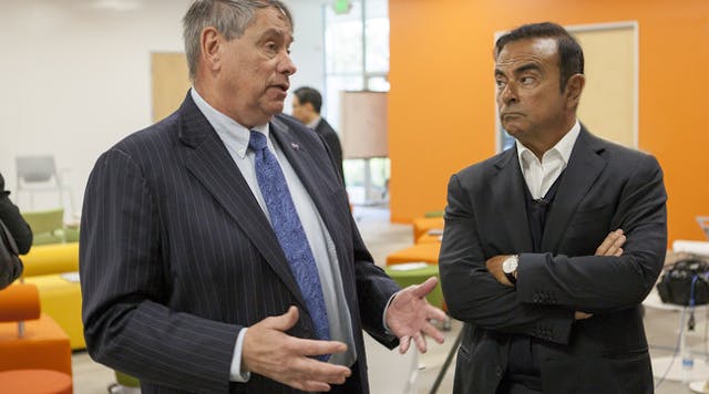 Nissan CEO Carlos Ghosn speaks with NASA&rsquo;s Ames Research Center director S. Pete Worden at the automaker&rsquo;s Silicon Valley research center.