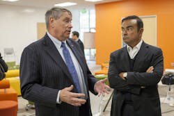 Nissan CEO Carlos Ghosn speaks with NASA&rsquo;s Ames Research Center director S. Pete Worden at the automaker&rsquo;s Silicon Valley research center.
