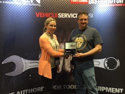 Matco Tools distributor Dean Ulsh, of Auburn, Pa., accepts an award for the 2015 Professional Distributor Mobile Distributor of the Year.