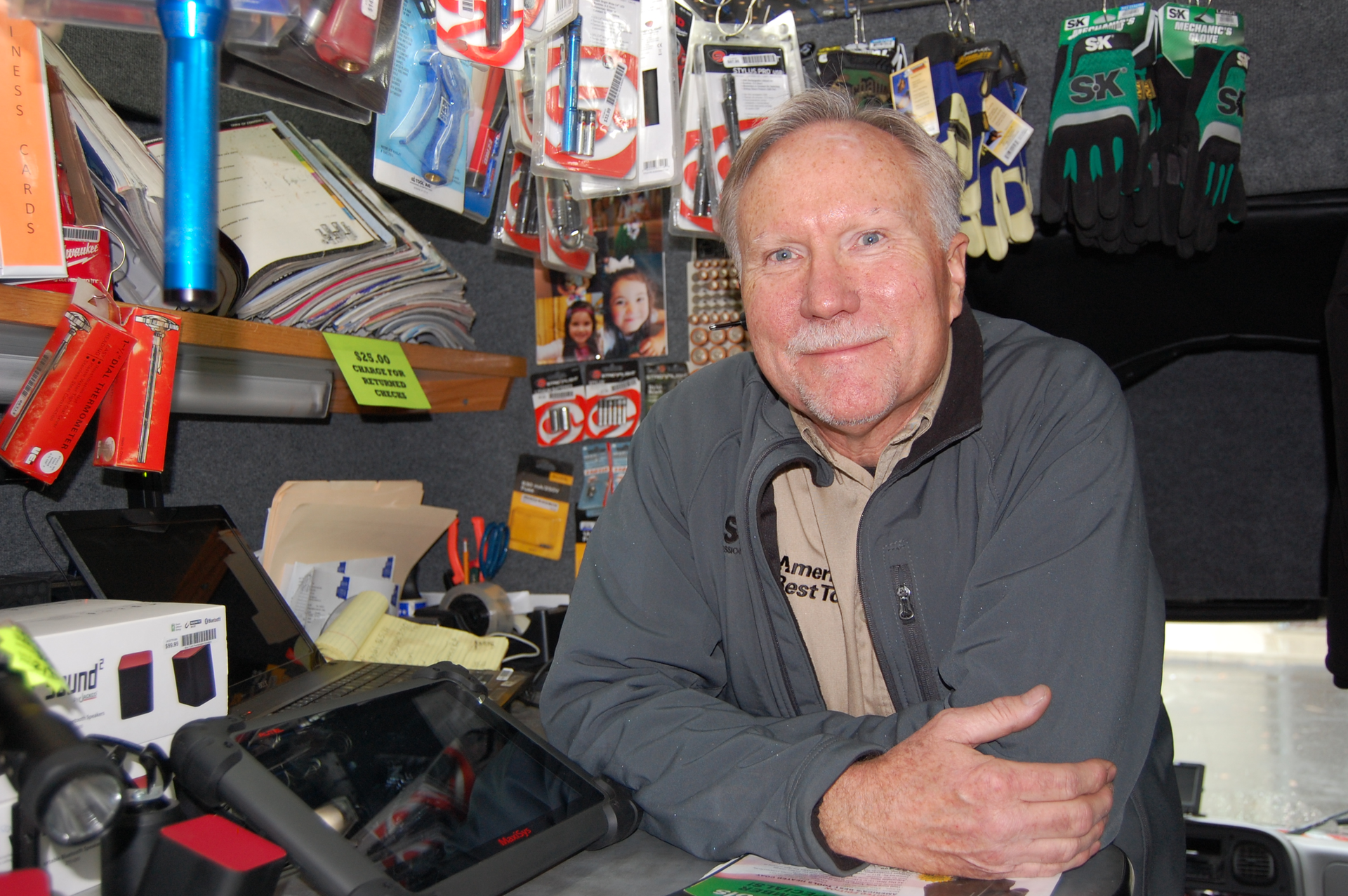 This corner desk near the walk-through cab of the truck allows Fyler to stay out of the way of his customers, so they can browse the truck.