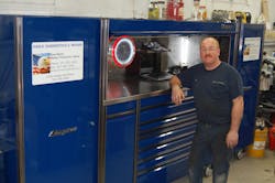 Dave Bonci stands next to his custom Snap-on toolbox.