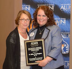 Patricia Pennington receives the Charles E. Thornton Outstanding Journalism Alumni Award on behalf of her late husband, D. Mike Pennington. Patricia Pennington receives the Charles E. Thornton Outstanding Journalism Alumni Award on behalf of her late husband, D. Mike Pennington.
