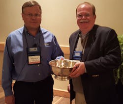 Rick Clemence (left), newly elected president of the Hand Tools Institute presents Earl Cunningham (right), the HTI Presidents Bowl in appreciation of his leadership and service to HTI. Rick Clemence (left), newly elected president of the Hand Tools Institute presents Earl Cunningham (right), the HTI Presidents Bowl in appreciation of his leadership and service to HTI.