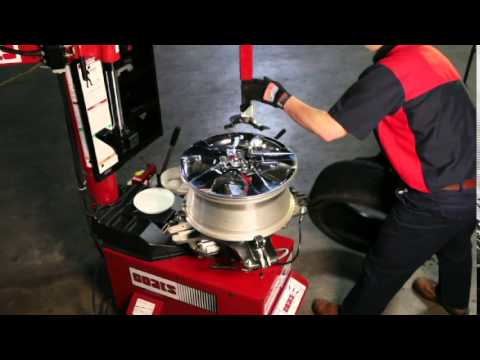 Coats changing plastic chrome clad wheels and high-spoke wheels Video